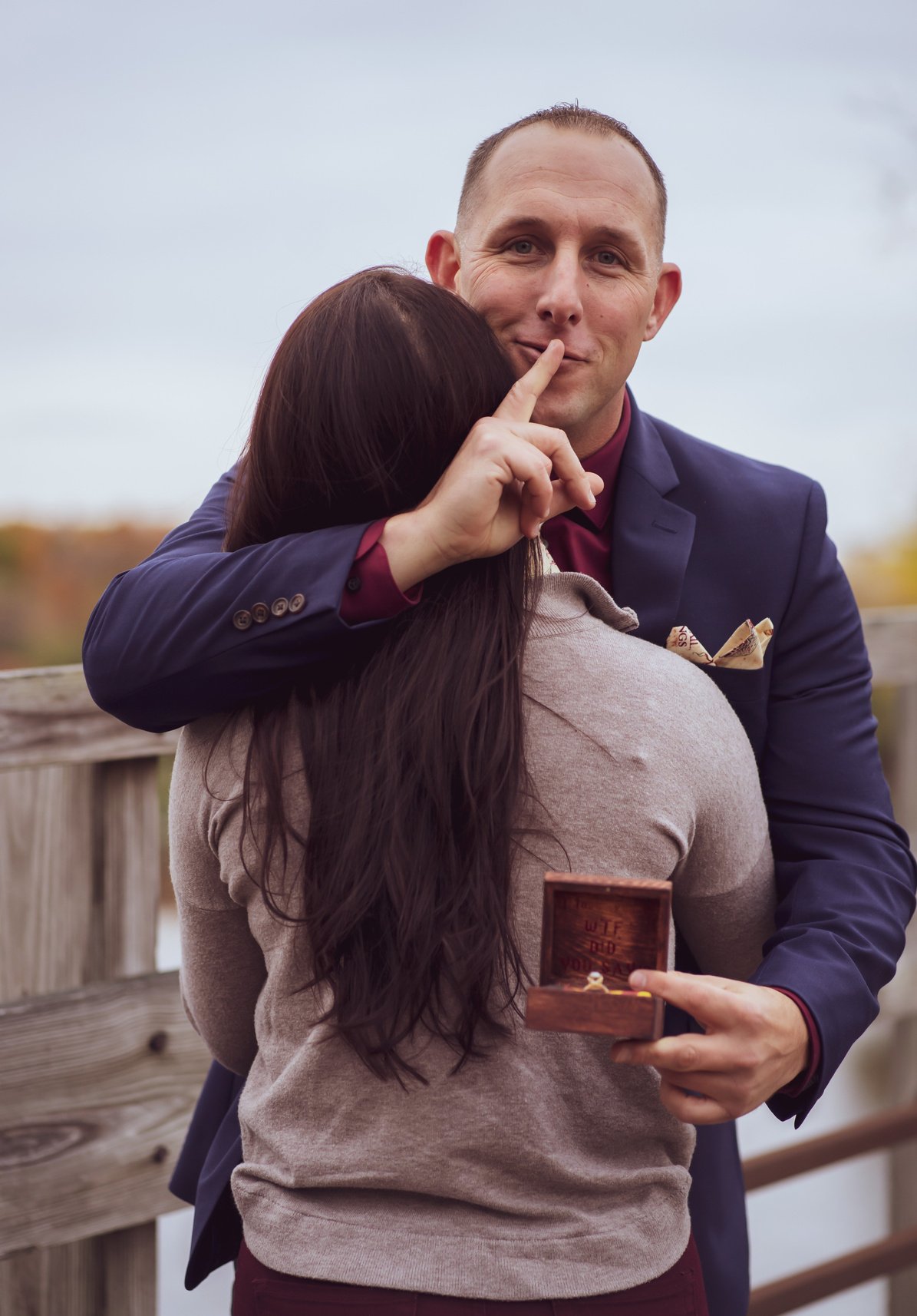 A Man Holding a Box with an Engagement Rin