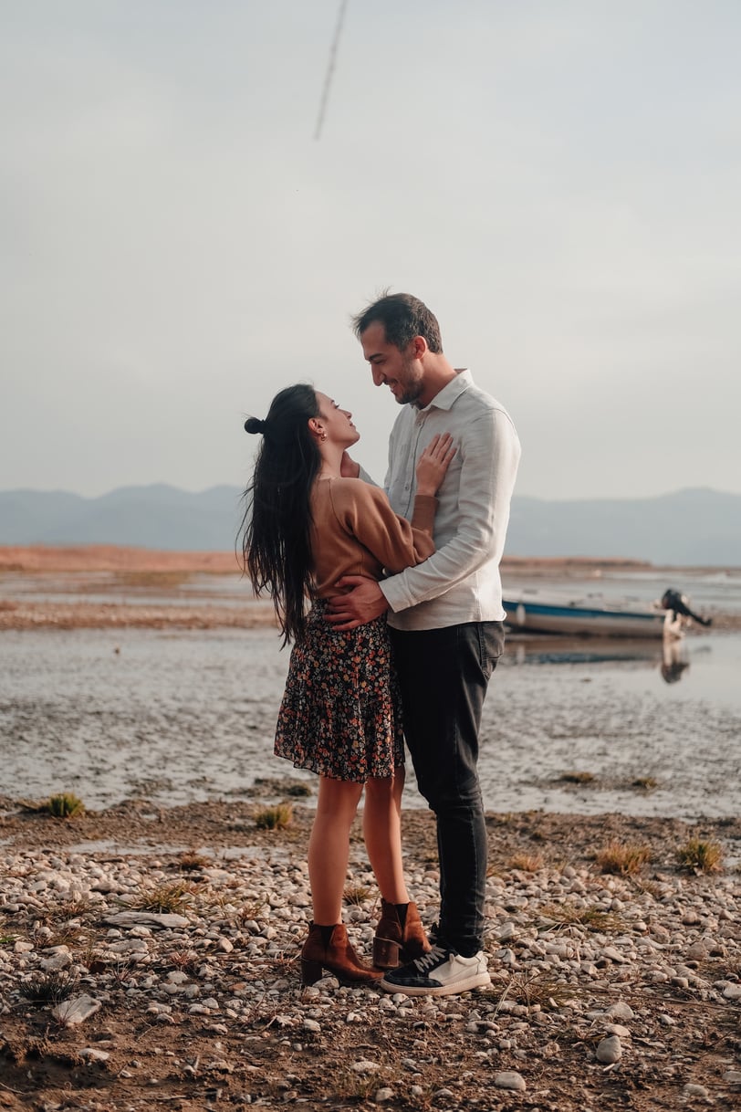 Newly Engaged Couple at Lakeside in Sunset